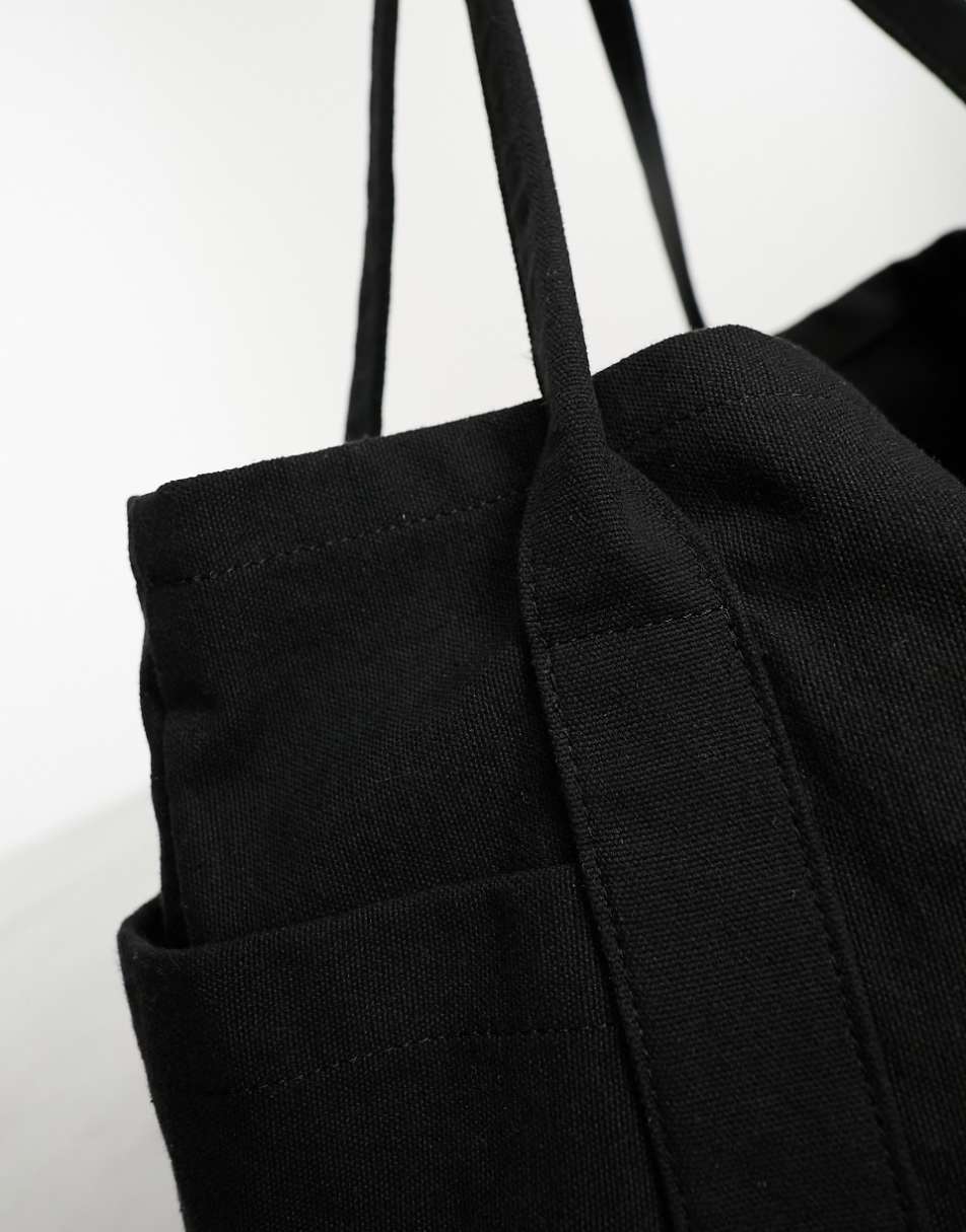 ASOS DESIGN oversized heavyweight canvas tote bag in black