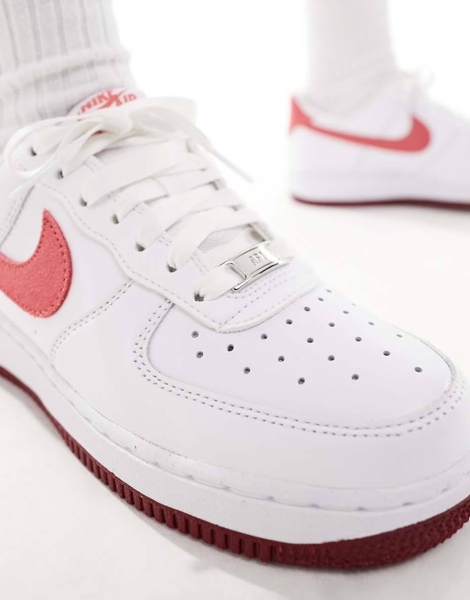 Nike Air Force 1 sneakers in white and red