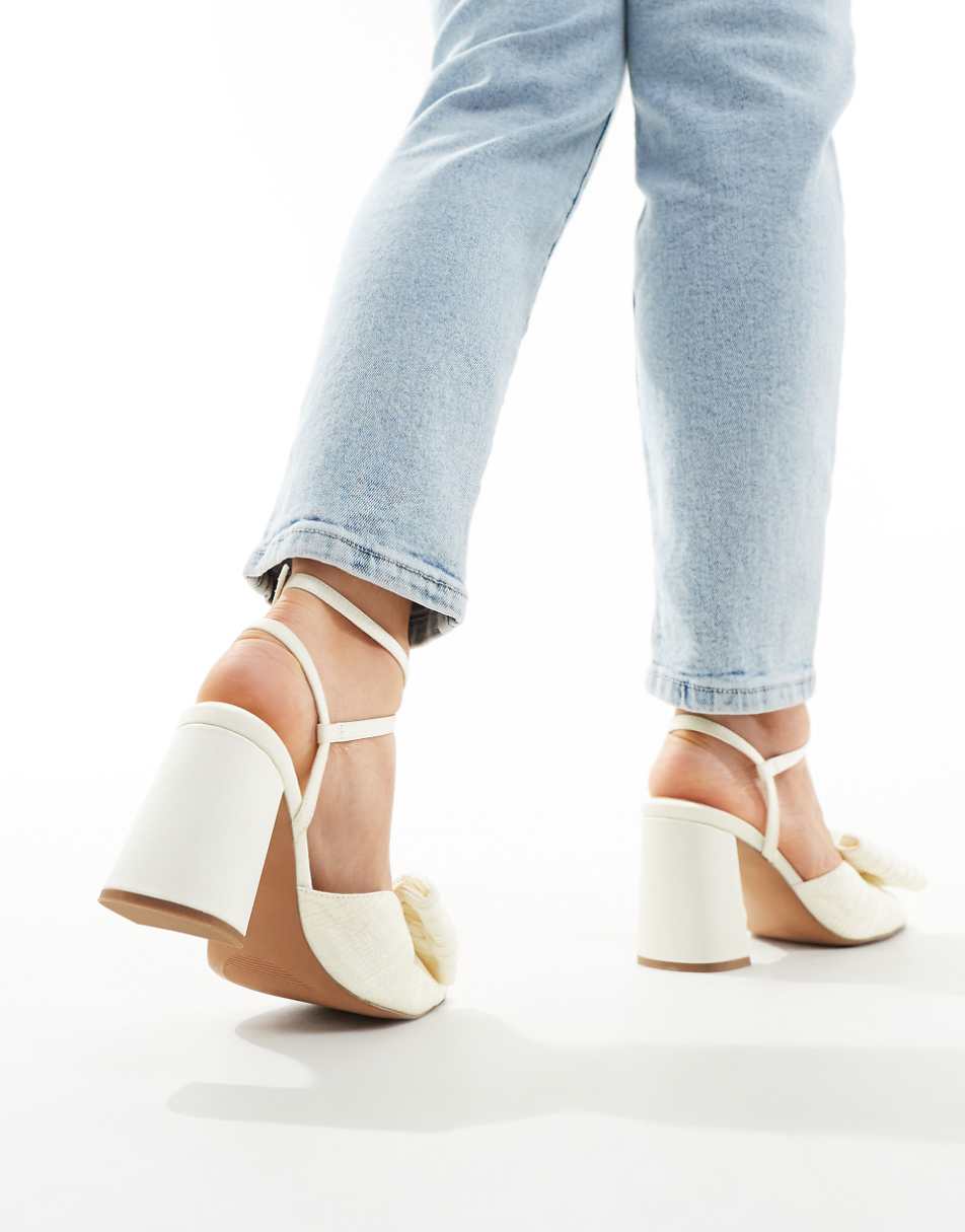ASOS DESIGN Wide Fit Hitched bow detail mid block heeled sandals in ivory