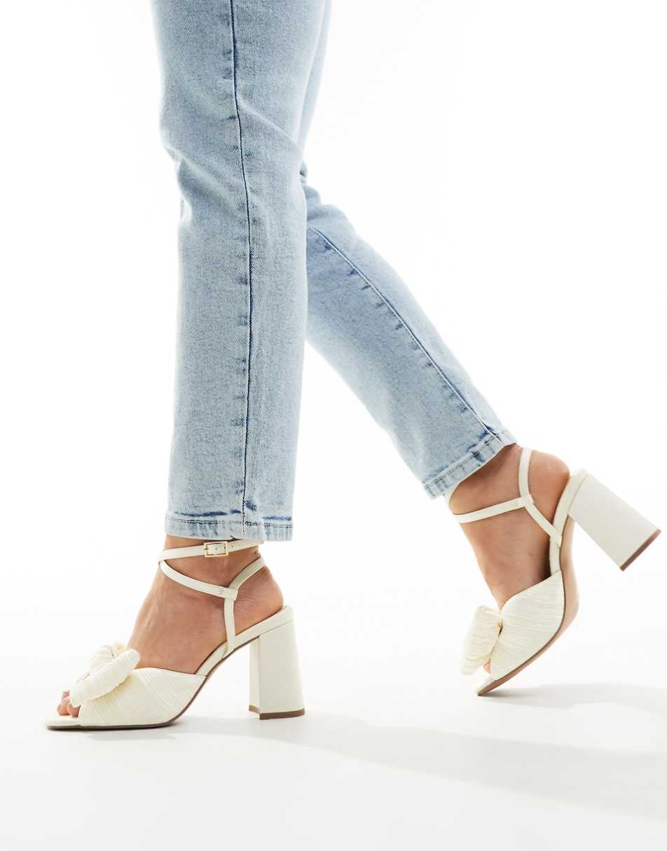 ASOS DESIGN Wide Fit Hitched bow detail mid block heeled sandals in ivory