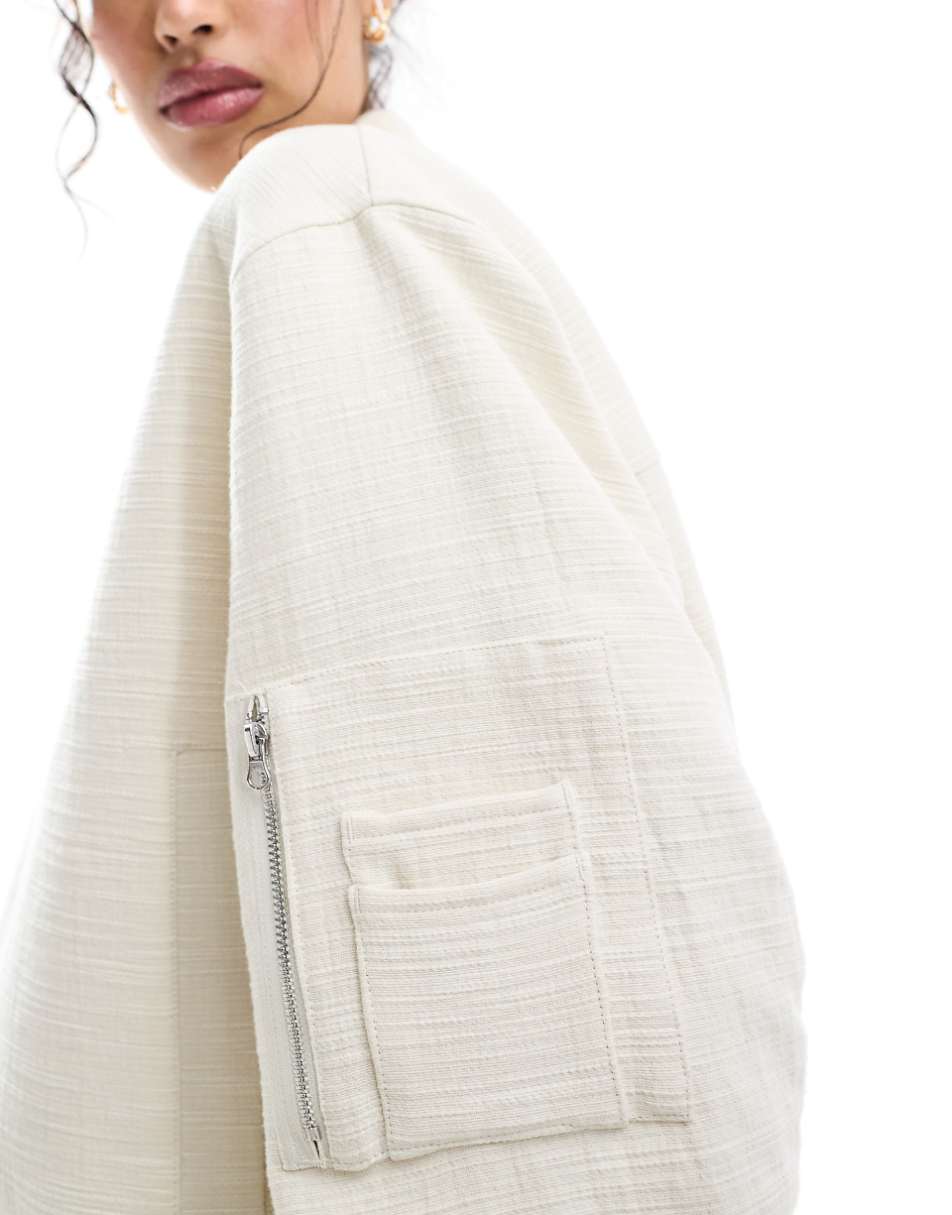 ASOS DESIGN textured crop bomber jacket in stone