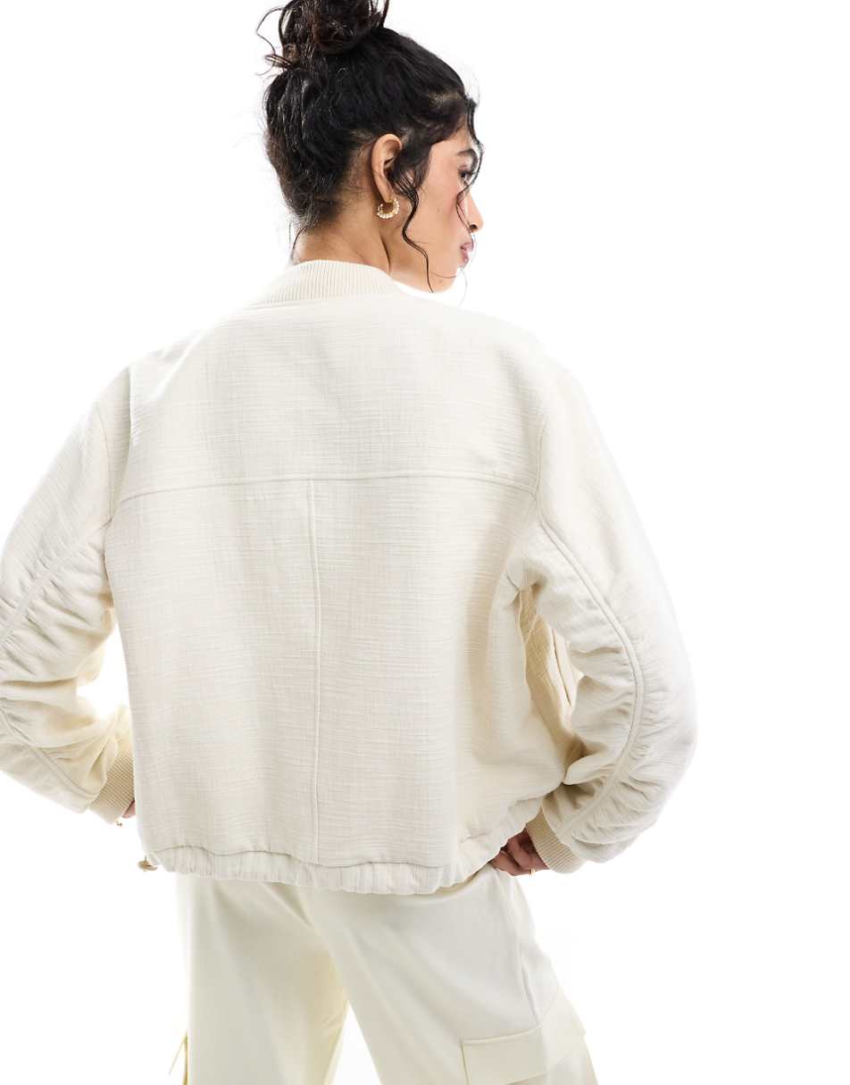 ASOS DESIGN textured crop bomber jacket in stone