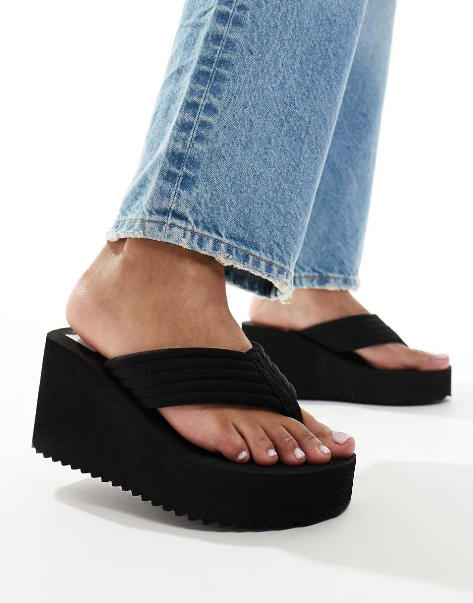 ASOS DESIGN Twister toe thong wedge sandals in black