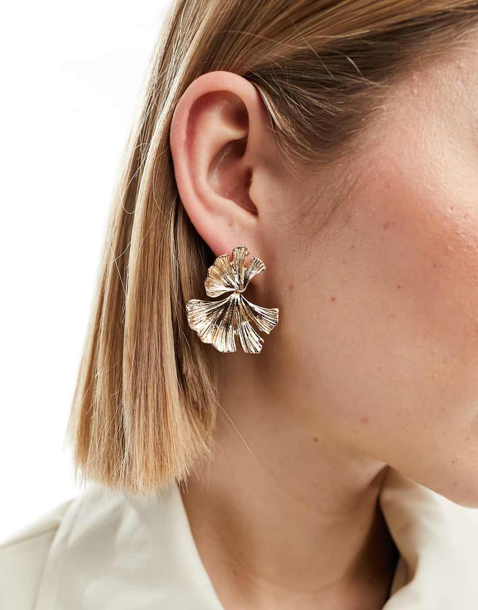 ASOS DESIGN drop earrings with textured leaf design in gold tone