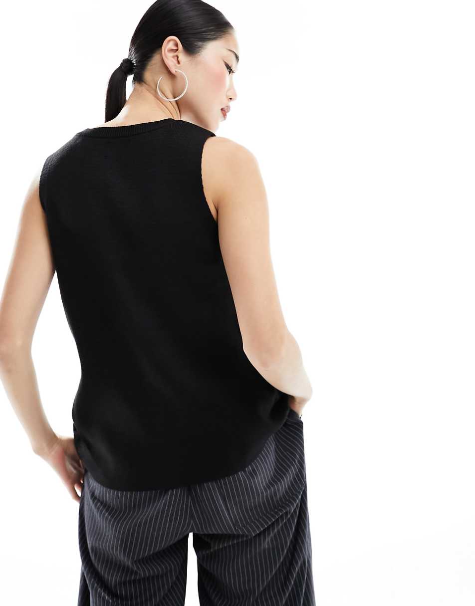 ASOS DESIGN knitted crew neck vest with front split in black