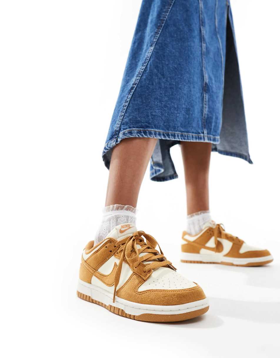 Nike Dunk Low sneakers in mustard