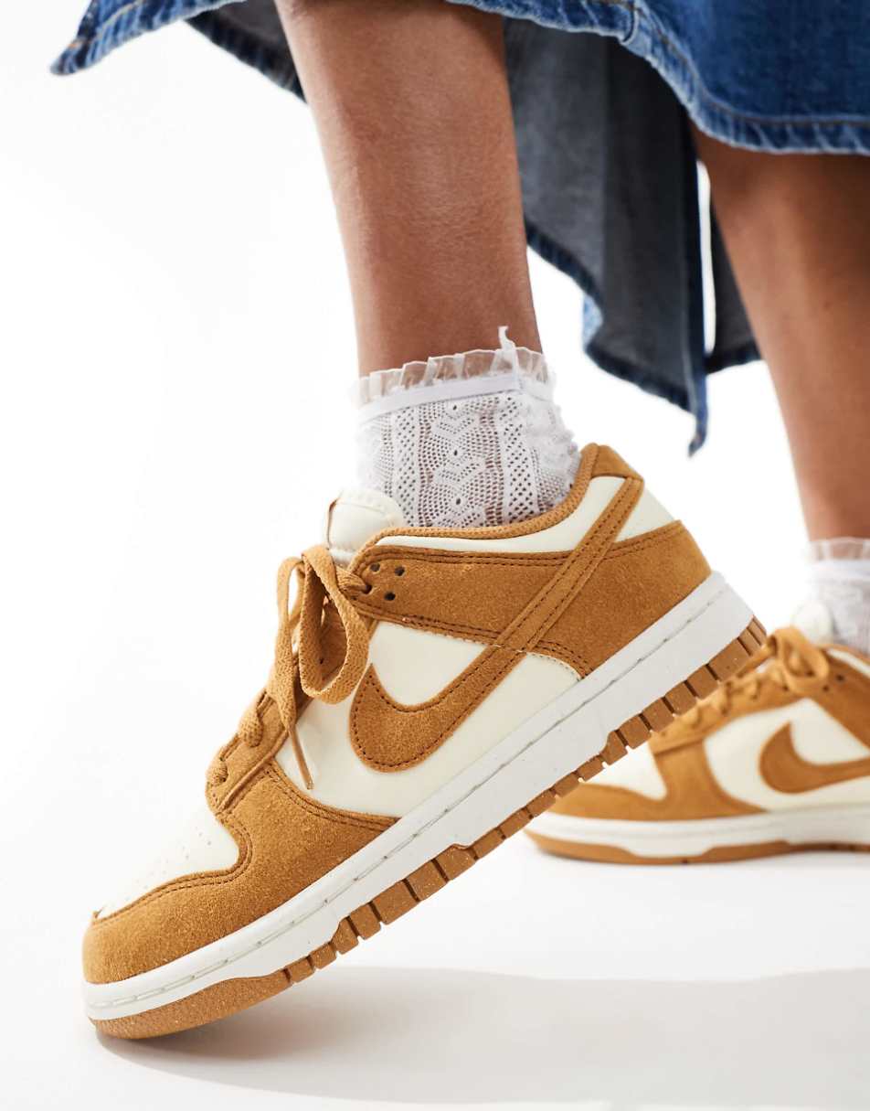 Nike Dunk Low sneakers in mustard