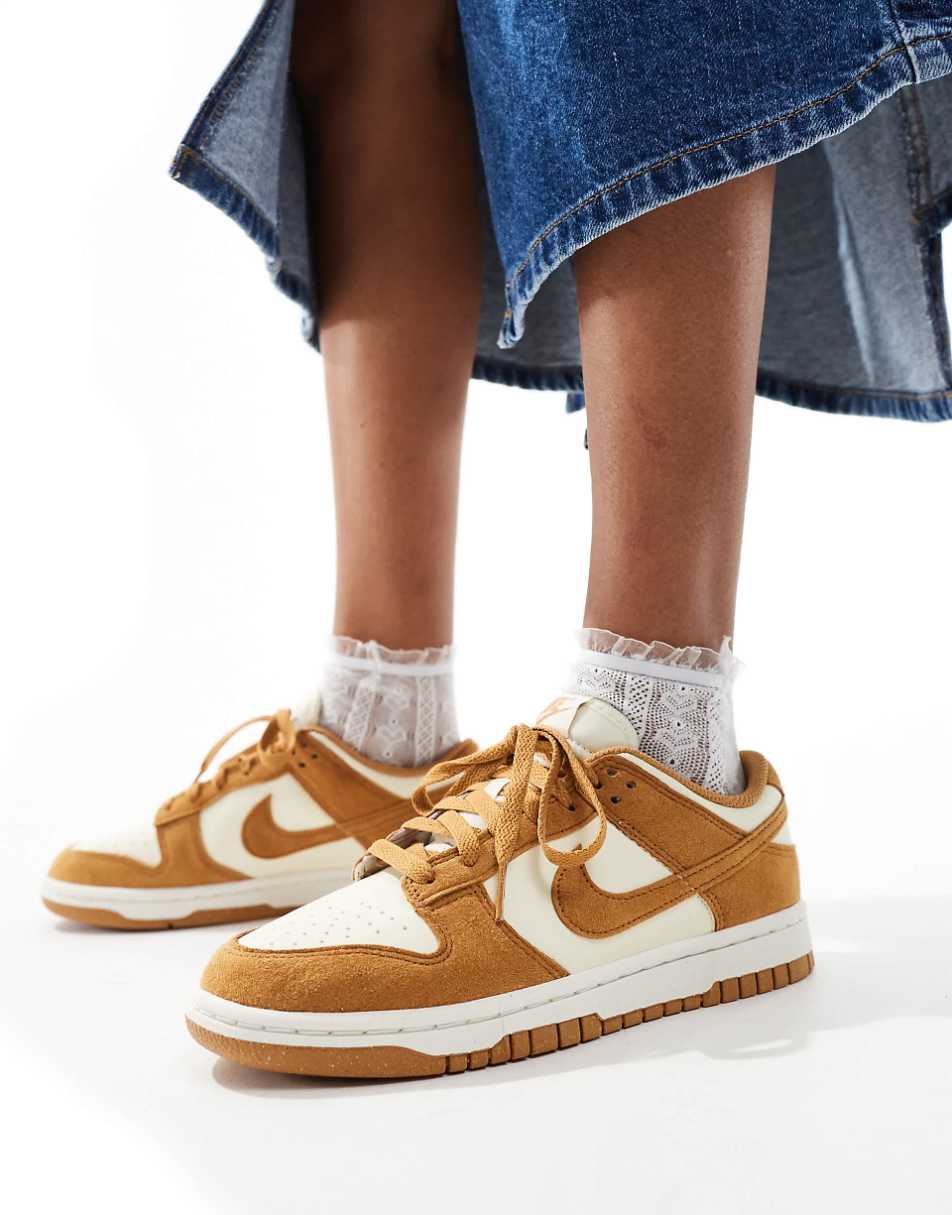 Nike Dunk Low sneakers in mustard