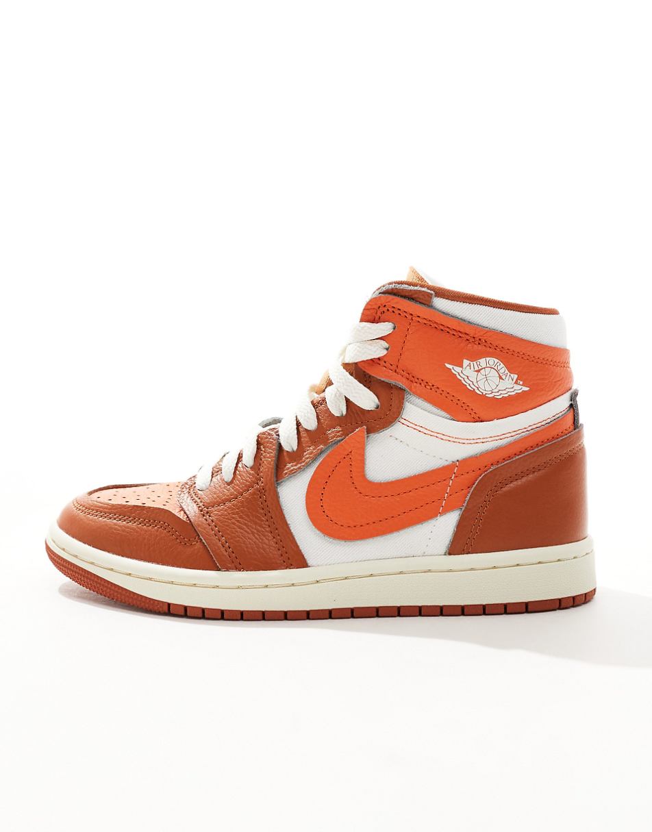 Nike Air Jordan 1 high sneakers in white and orange