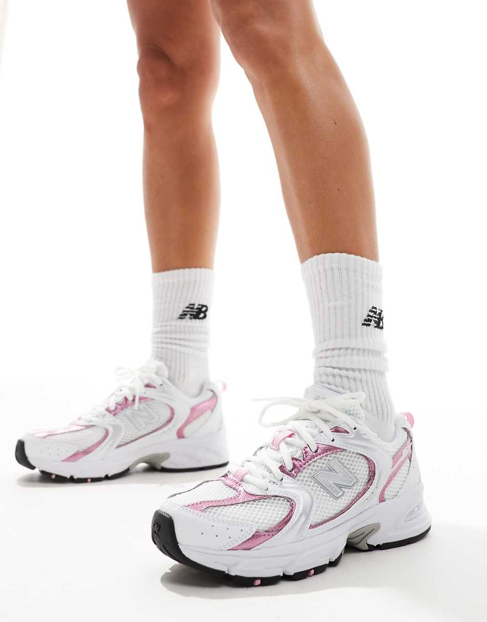 New Balance 530 sneakers in white with pink metallic details