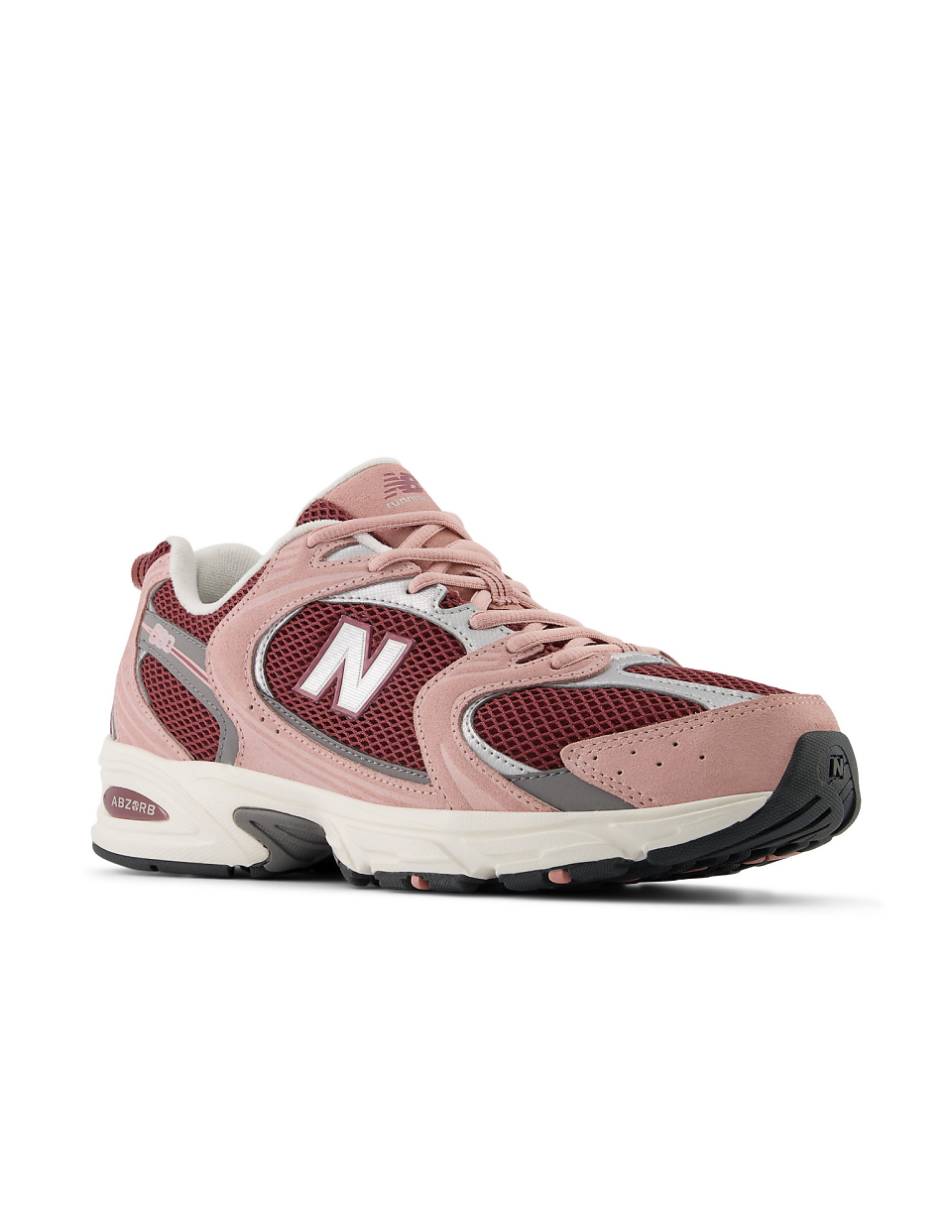 New Balance 530 sneakers in red with pink and silver details