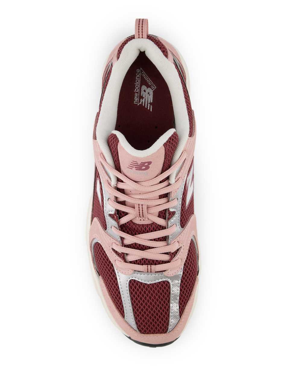 New Balance 530 sneakers in red with pink and silver details
