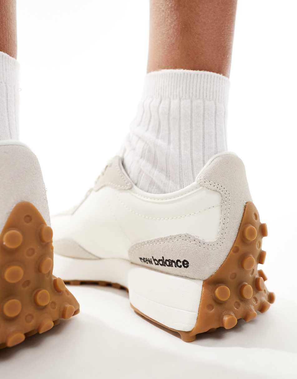 New Balance 327 gum sole sneakers in off white and black
