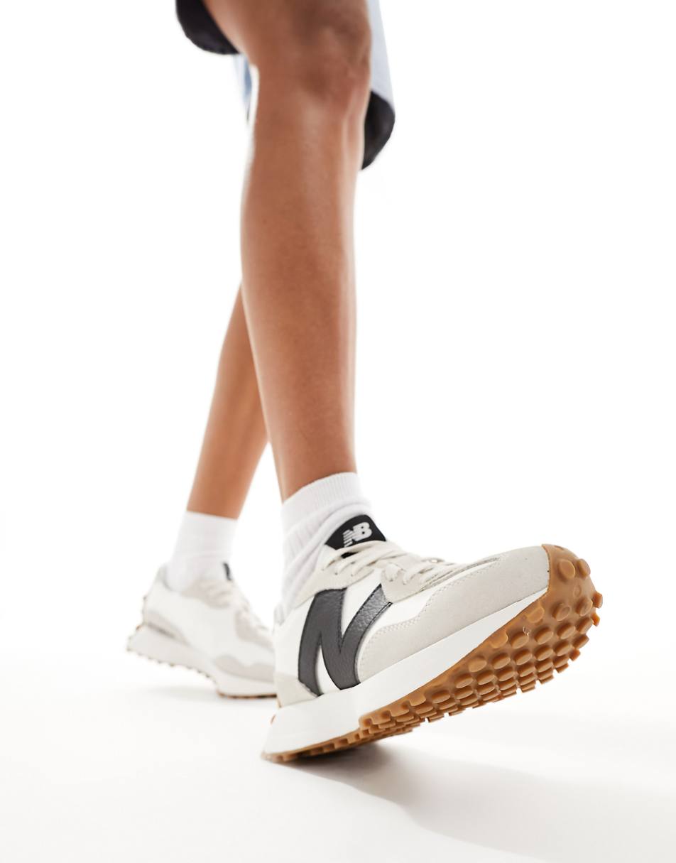 New Balance 327 gum sole sneakers in off white and black