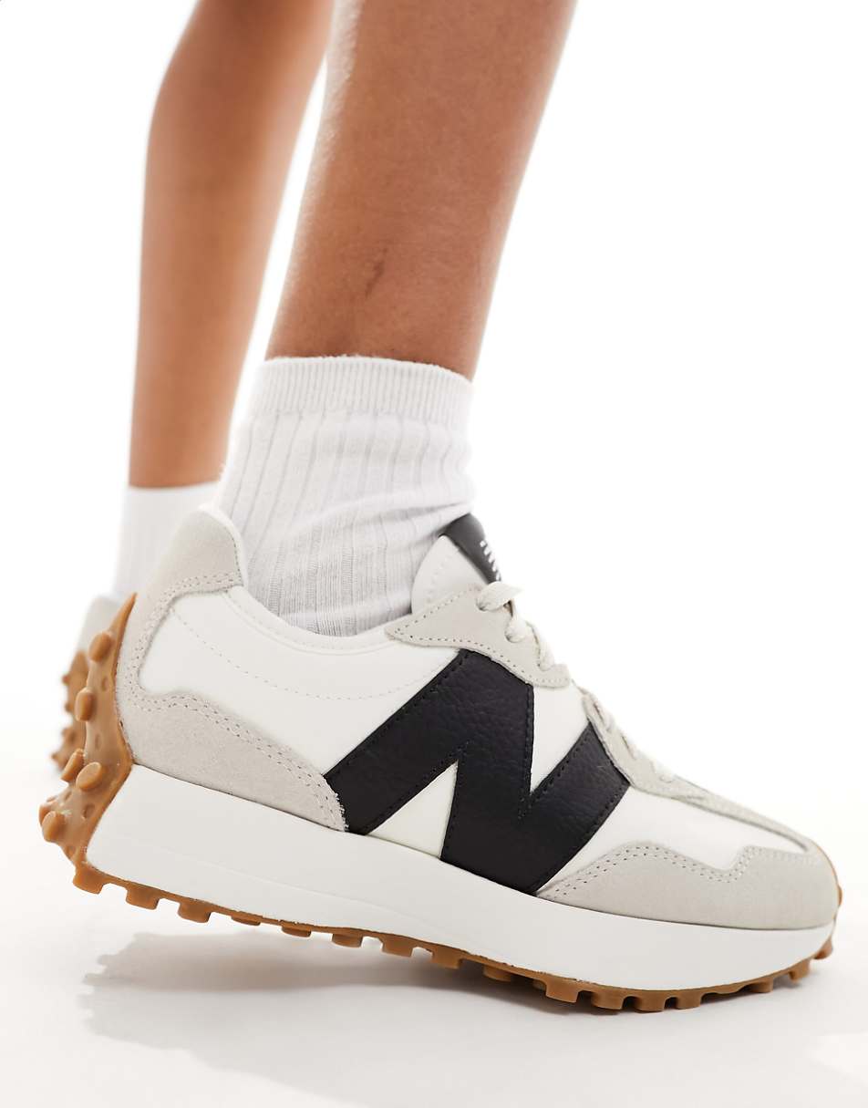 New Balance 327 gum sole sneakers in off white and black