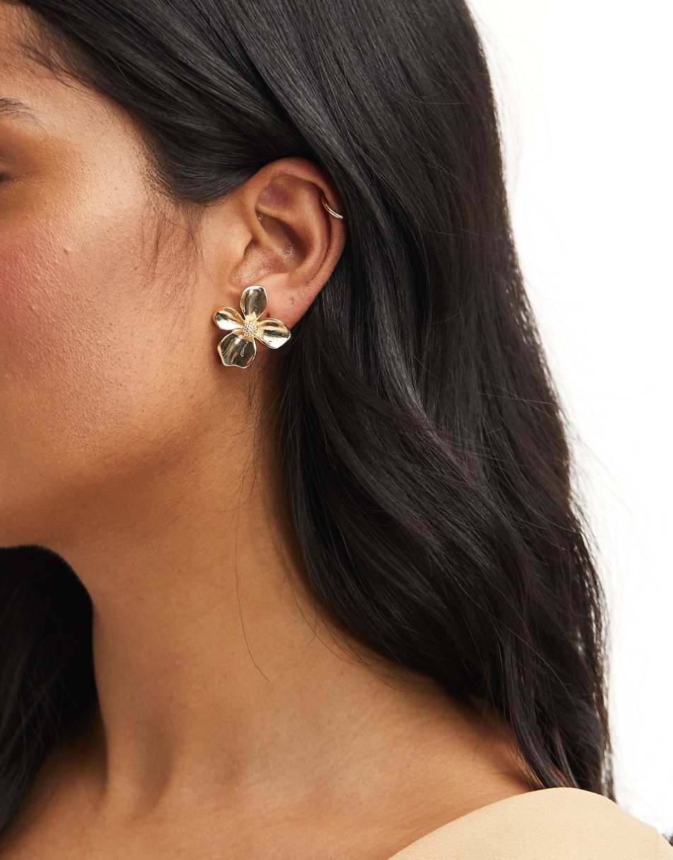 ASOS DESIGN stud earrings with small floral design in gold tone