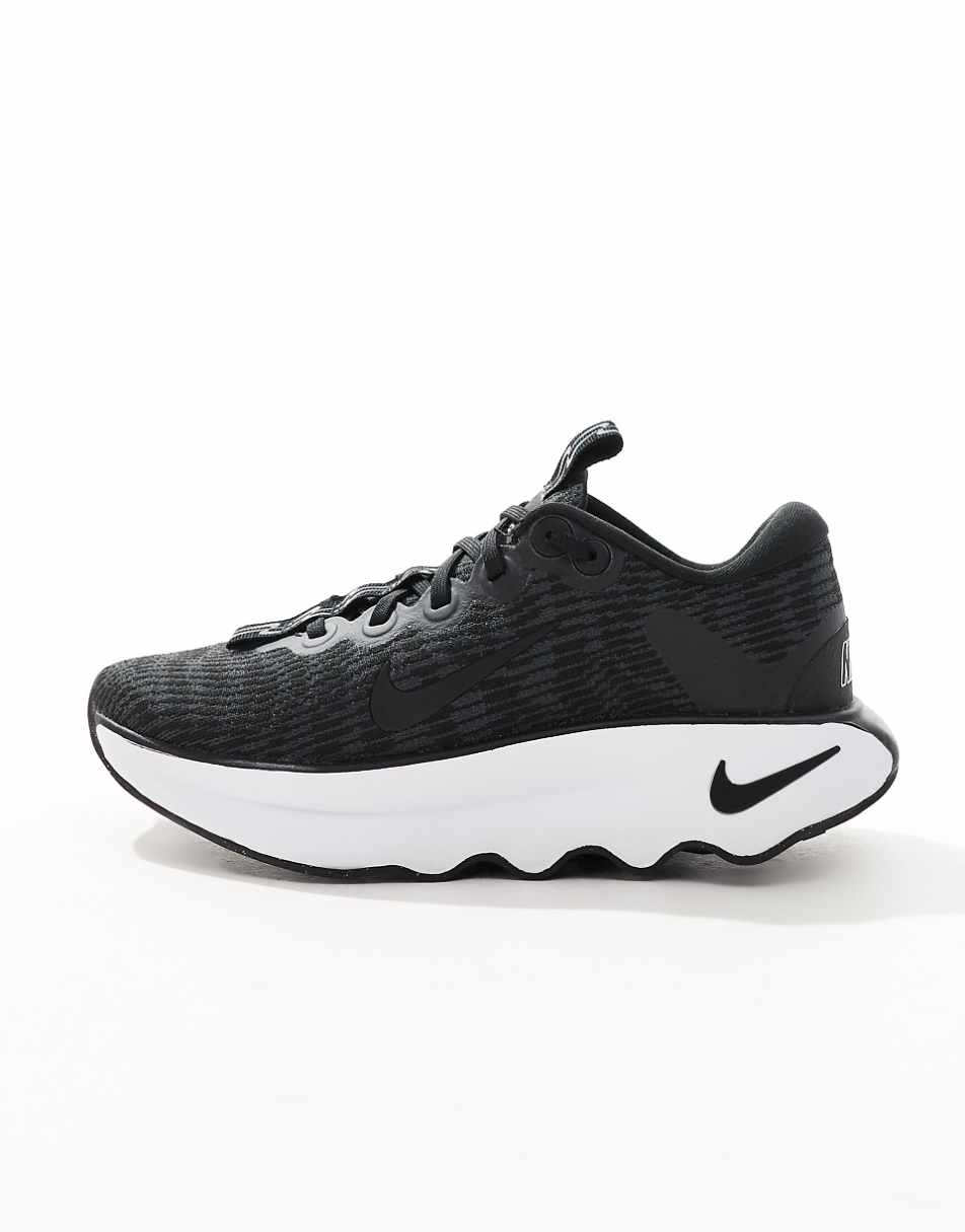 Nike Training Motiva sneakers in black and white