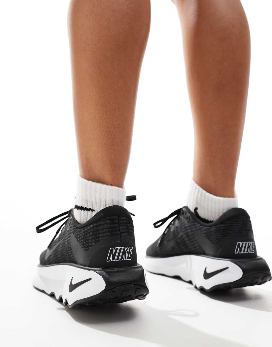 Nike Training Motiva sneakers in black and white