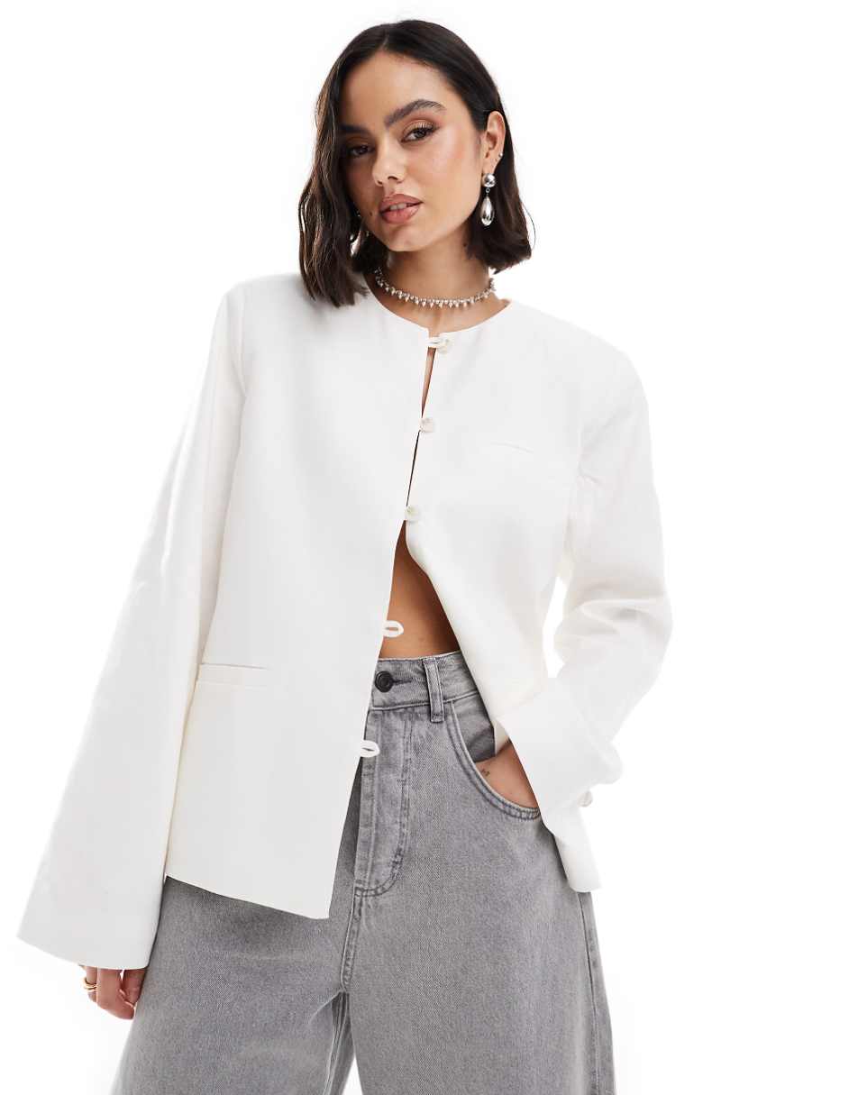 NA-KD linen collarless jacket in white