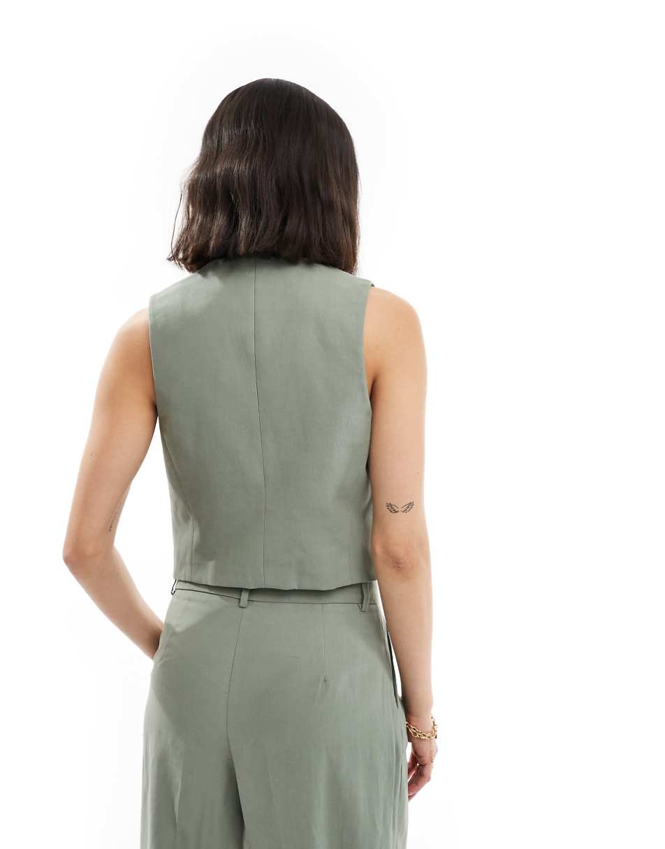 Mango lightweight vest in light green - part of a set