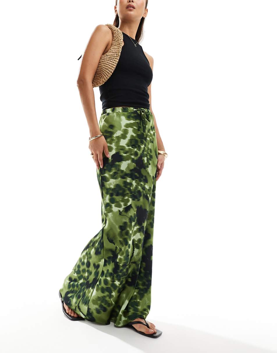 ASOS DESIGN satin bias tie waist maxi skirt in green animal print