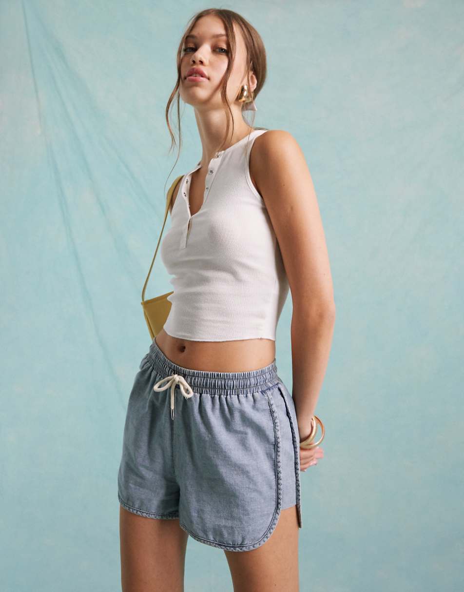 Miss Selfridge denim runner shorts in light blue wash