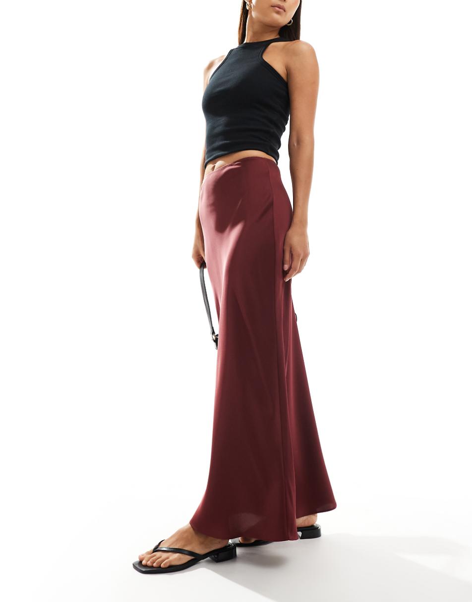 ASOS DESIGN satin bias cut maxi skirt in burgundy