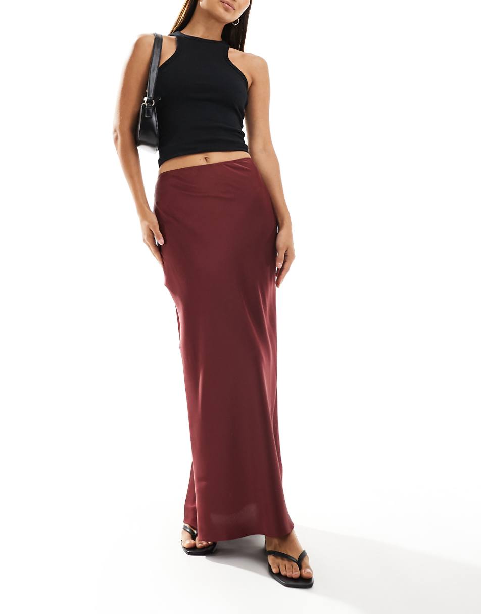 ASOS DESIGN satin bias cut maxi skirt in burgundy