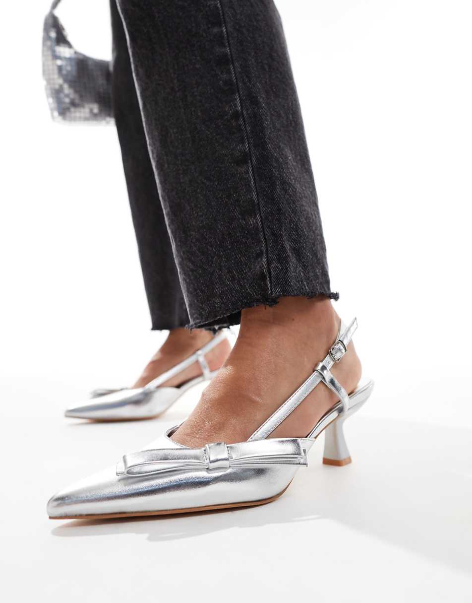 Glamorous slingback kitten heel shoes with bow in silver