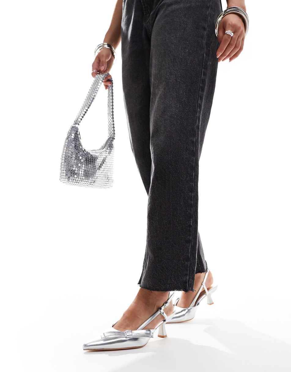 Glamorous slingback kitten heel shoes with bow in silver