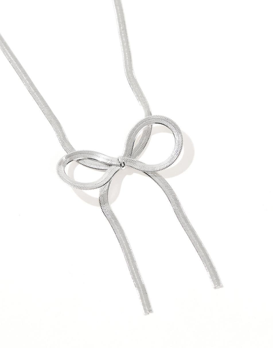 ASOS DESIGN necklace with snake chain bow detail in silver tone