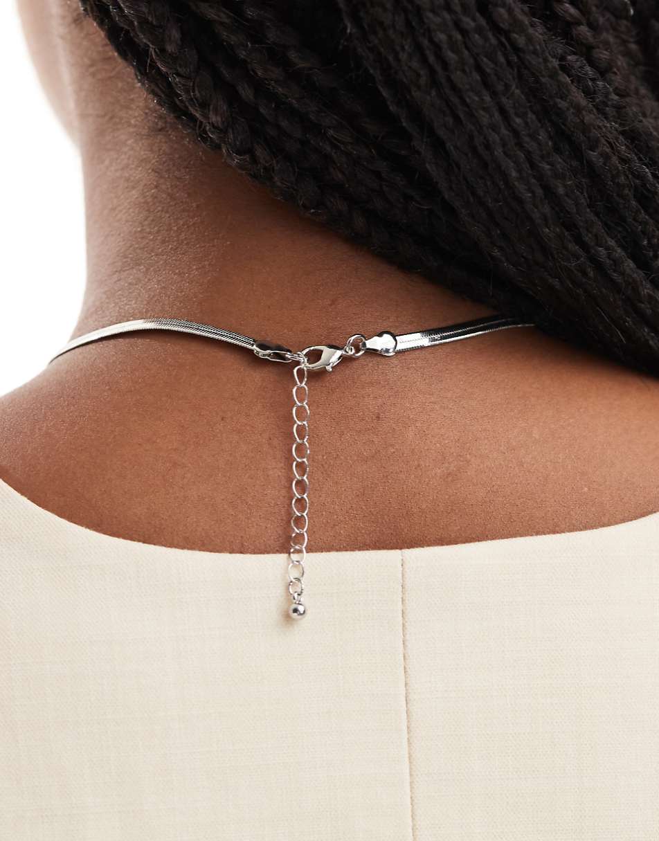 ASOS DESIGN necklace with snake chain bow detail in silver tone