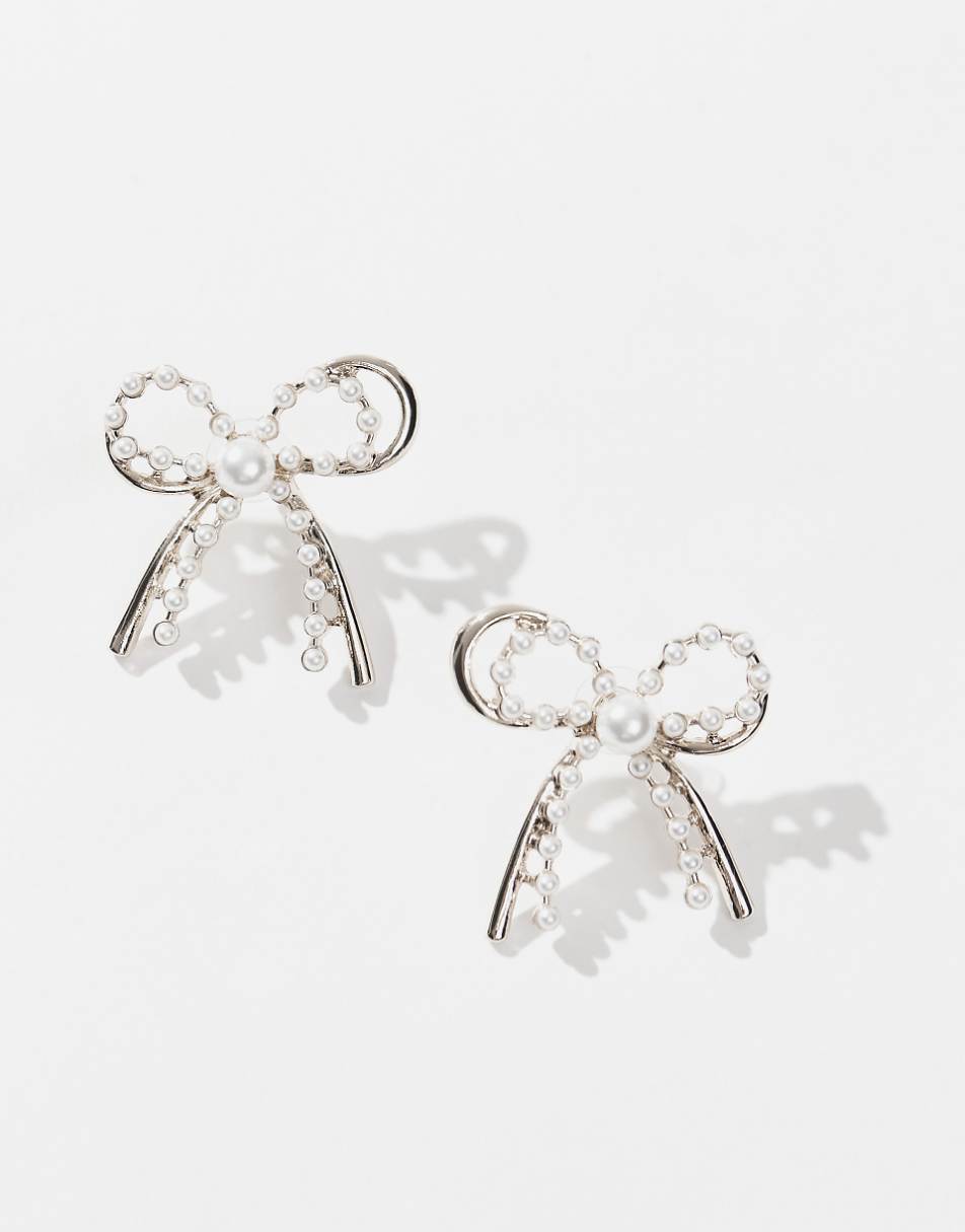 8 Other Reasons rhodium plated pearl embellished bow earrings in gold