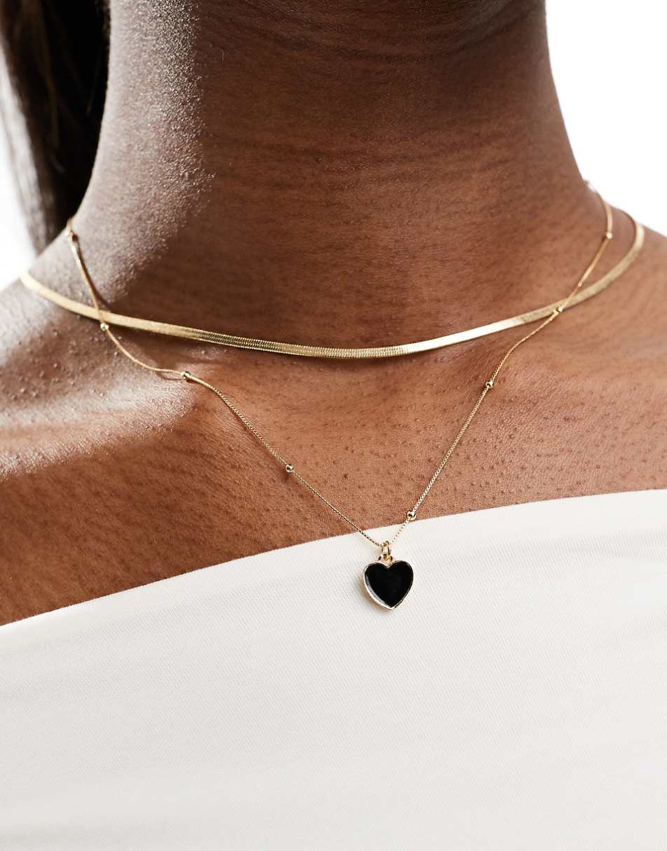ASOS DESIGN pack of 2 necklaces with black enamel heart chain in gold tone