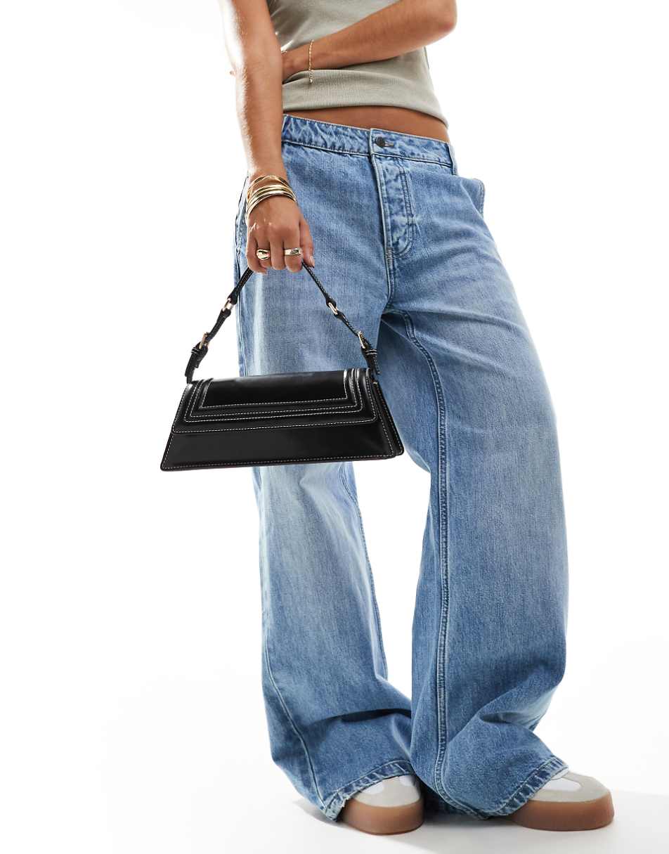 ASOS DESIGN structured elongated shoulder bag with contrast stitch in black