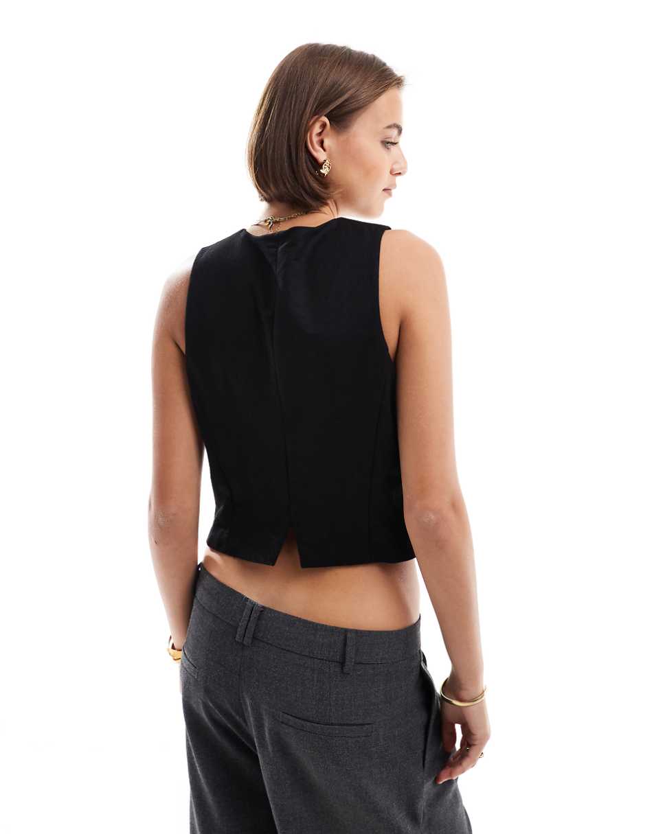 Mango button front vest in black