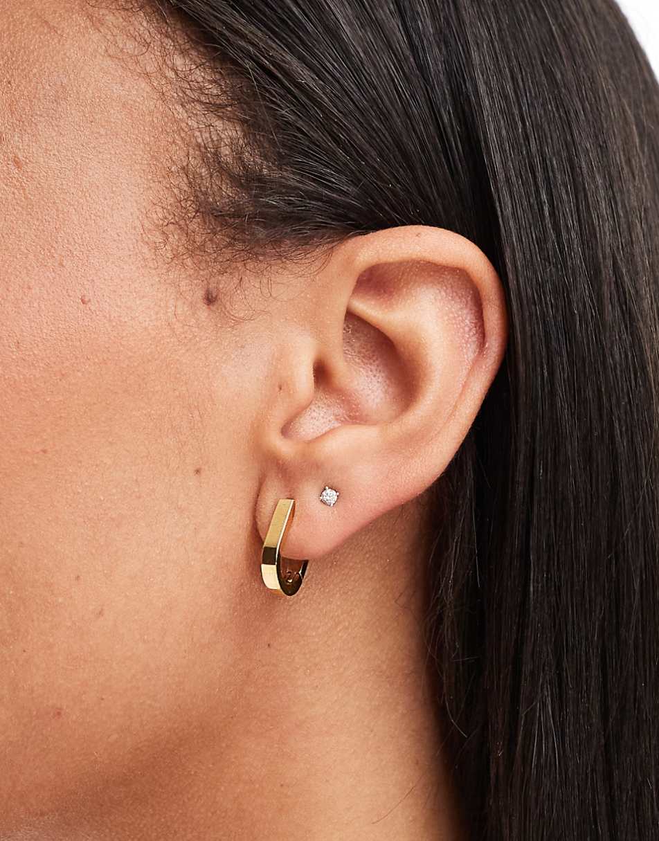 ASOS DESIGN waterproof stainless steel hoop earrings with oval clicker detail in gold tone