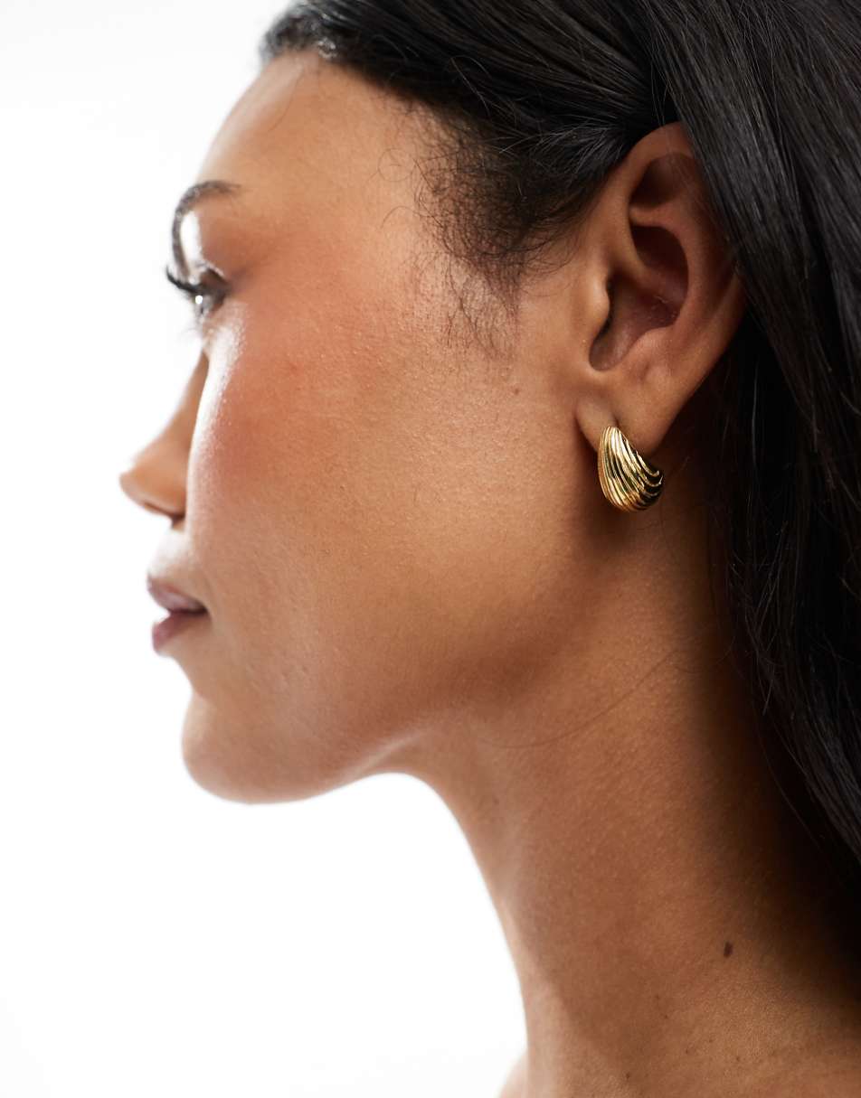 ASOS DESIGN waterproof stainless steel stud earrings with ridged molten detail in gold tone