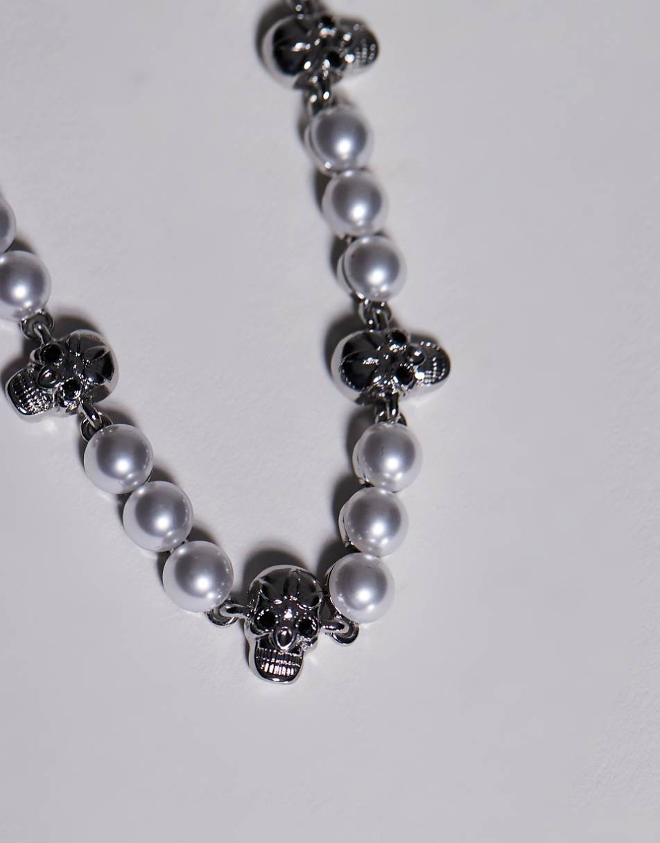 ASOS DESIGN Curve Halloween choker necklace with faux pearl and skull design in silver tone