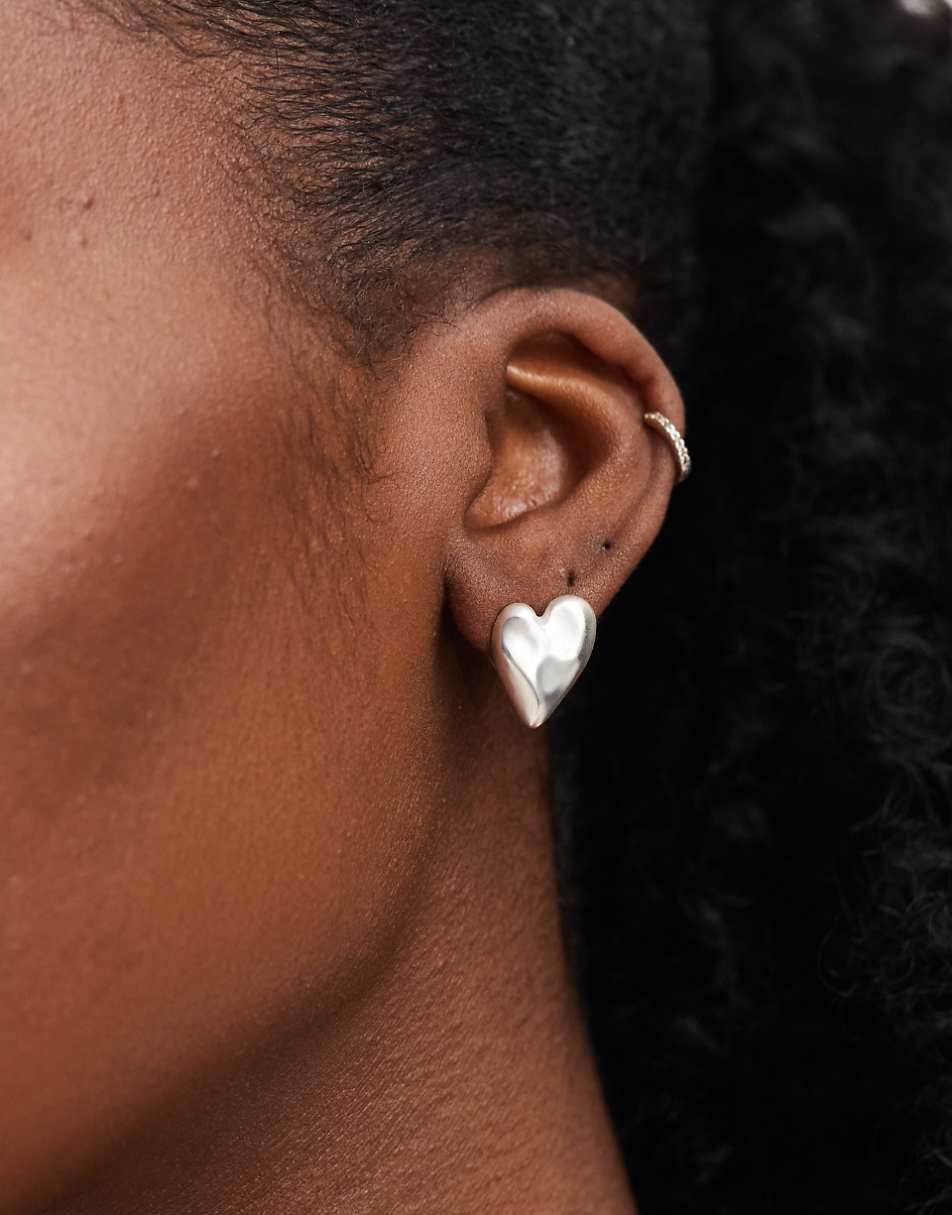 ASOS DESIGN stud earrings with molten heart detail in brushed silver