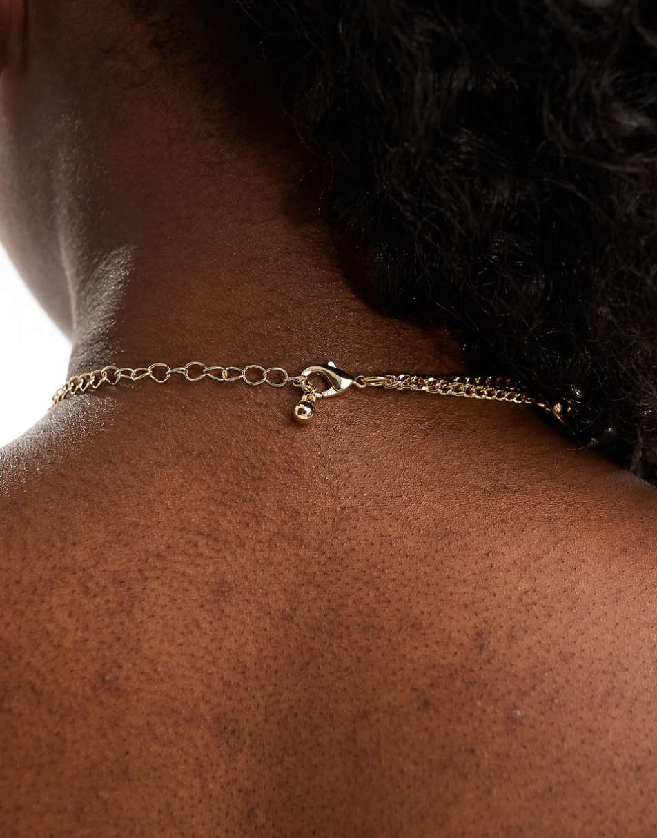 ASOS DESIGN choker necklace with ribbed design in gold tone