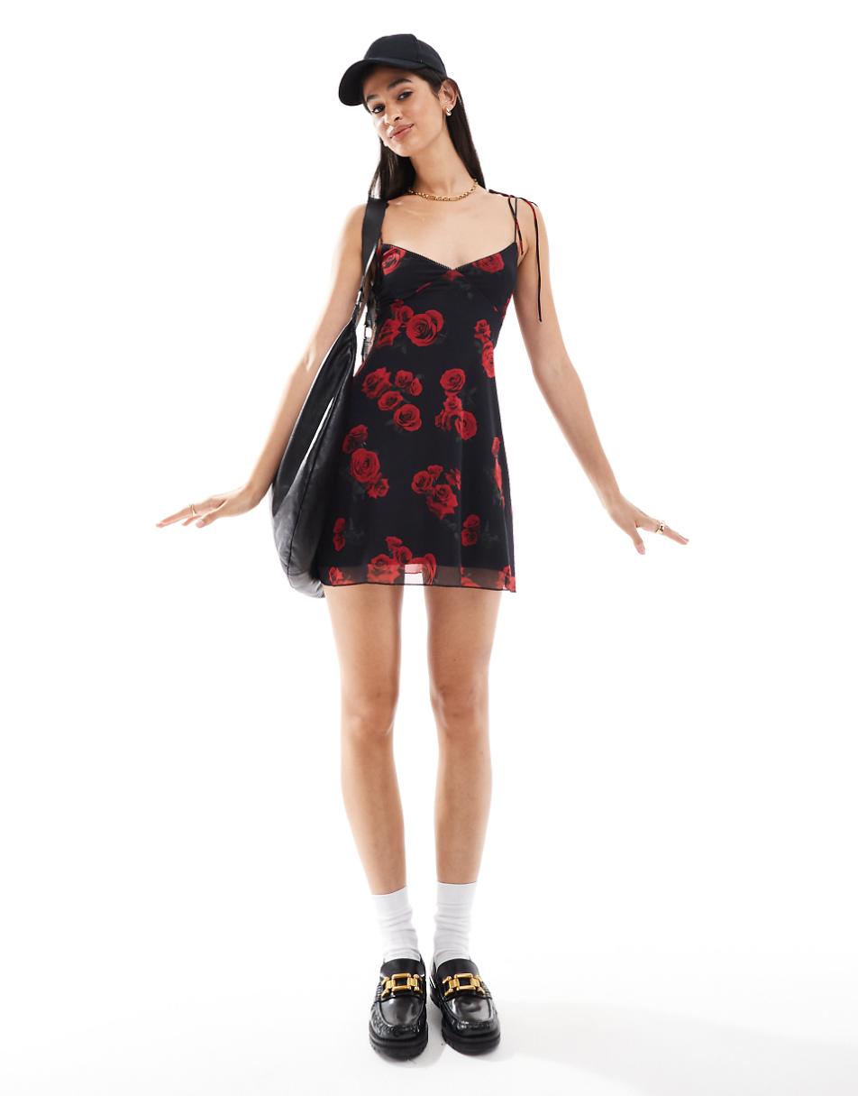 Bershka rose print strappy mini dress in black