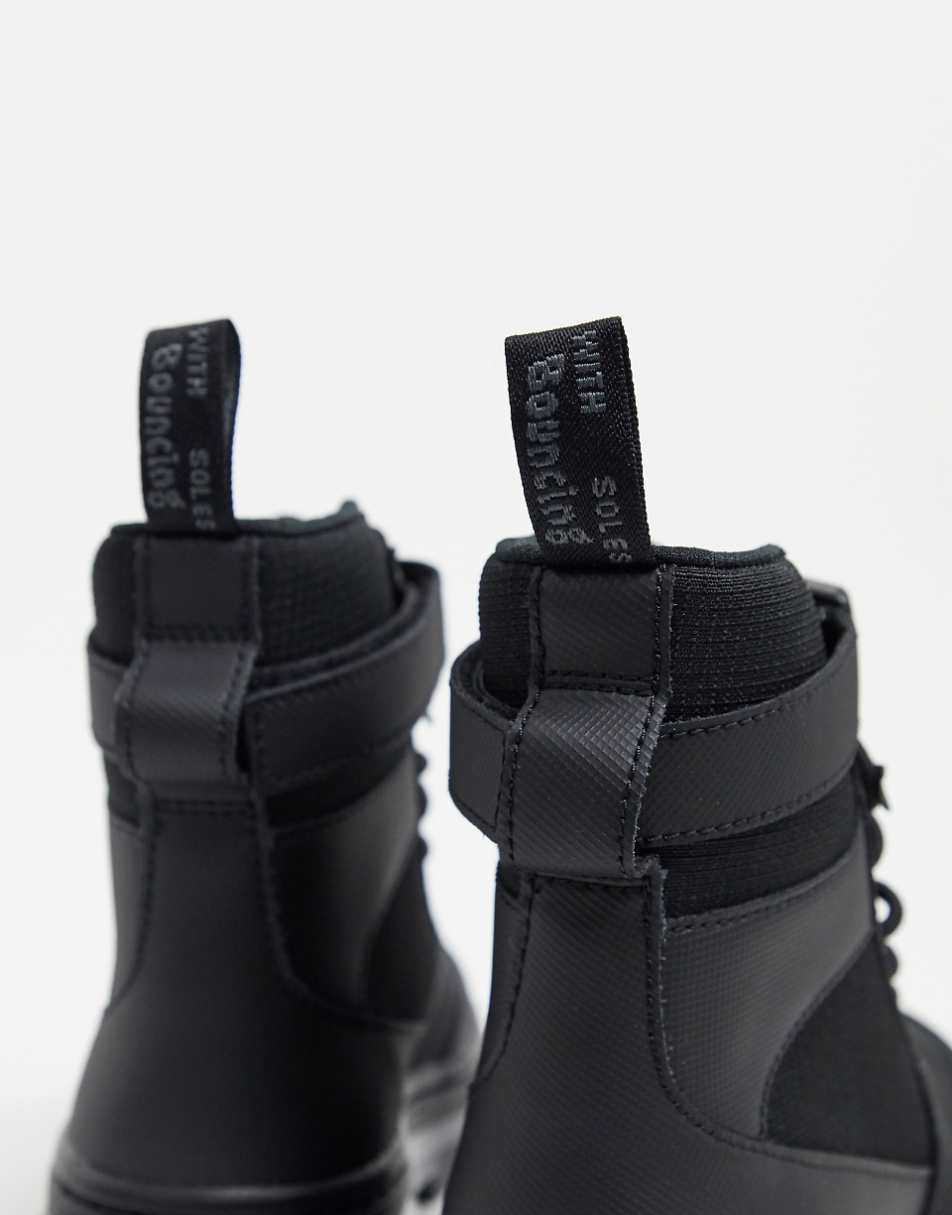 Dr Martens Combs tech ankle strap ankle boots in black