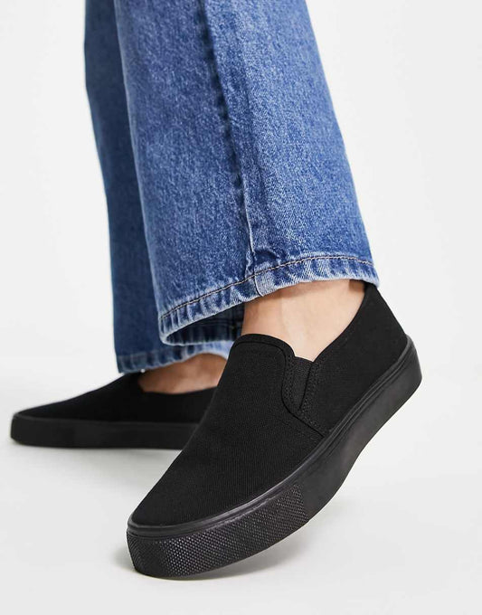 ASOS DESIGN Dotty slip on sneakers in black