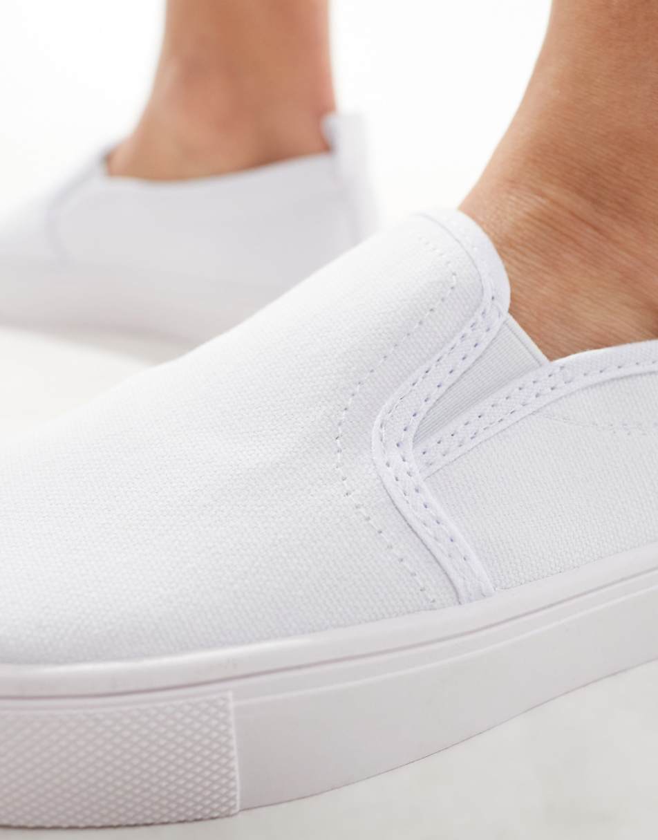 ASOS DESIGN Dotty slip on plimsolls in white