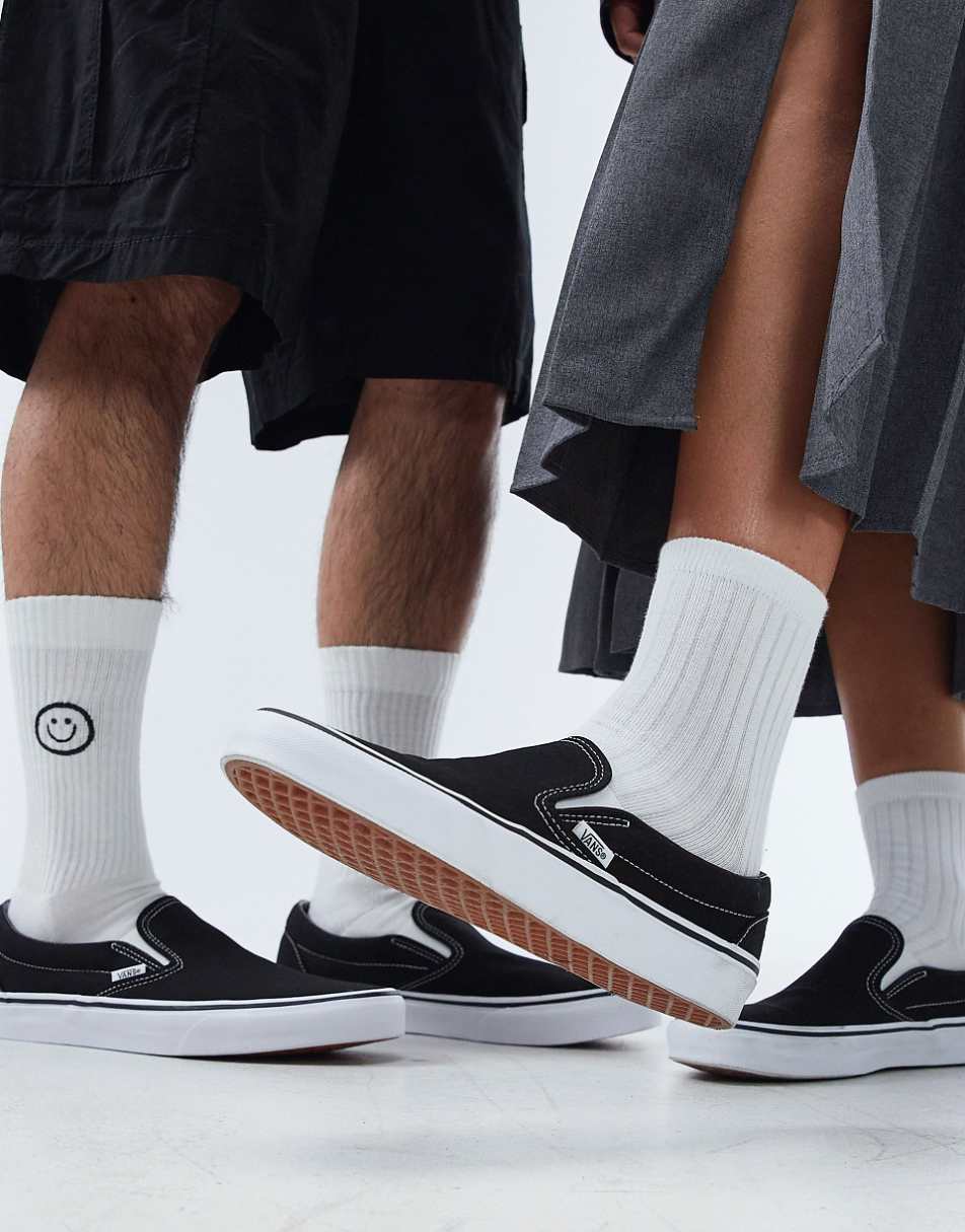 Vans Classic Slip-On sneakers in black and white