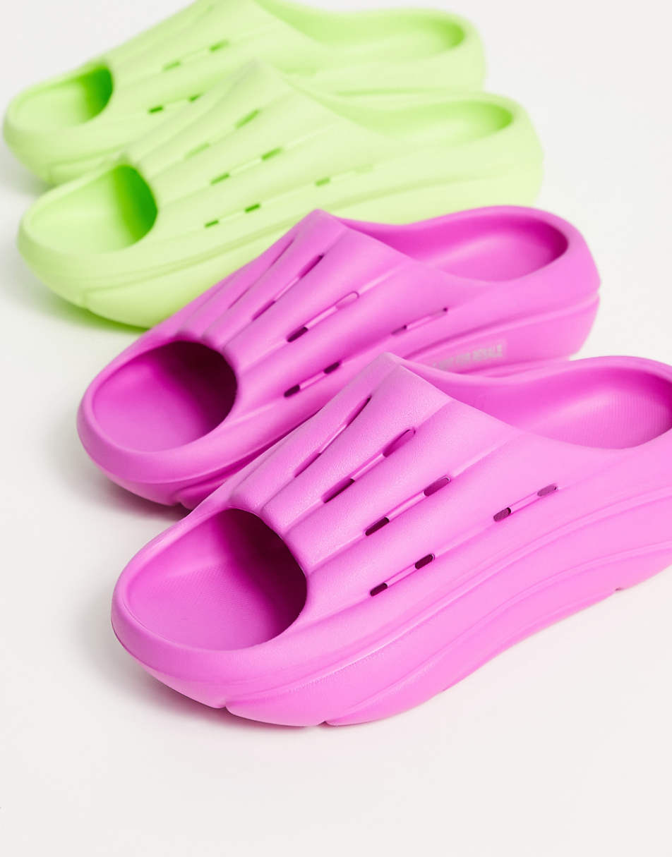 UGG foam slides in bright pink