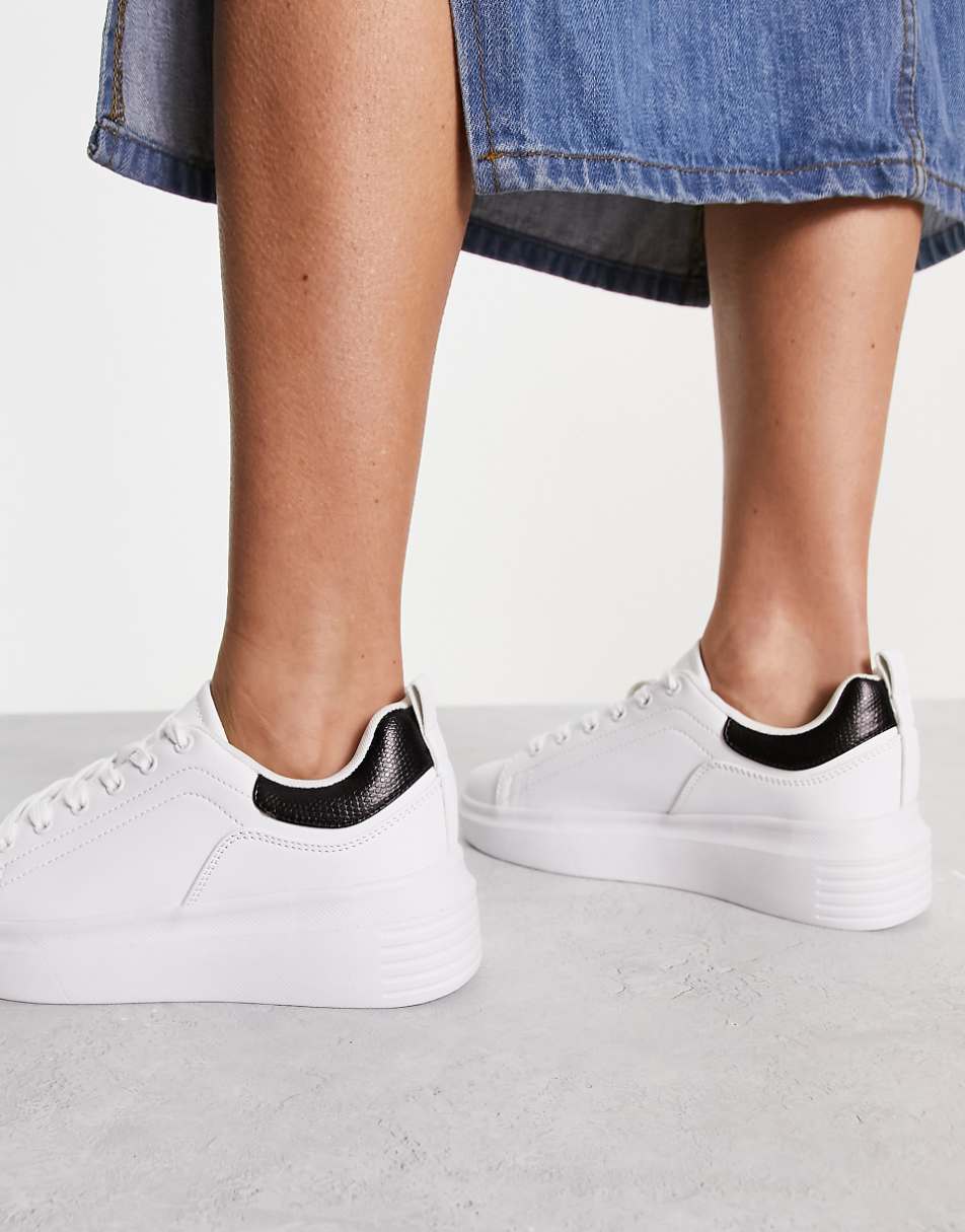 Truffle Collection chunky sneakers in white with black back tab