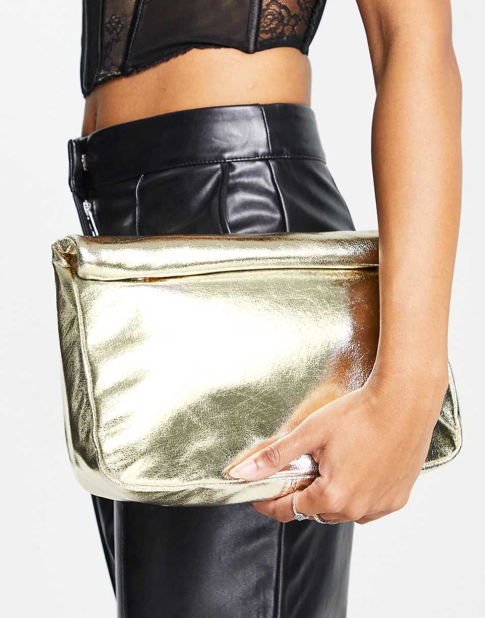 ASOS DESIGN roll top clutch bag in gold