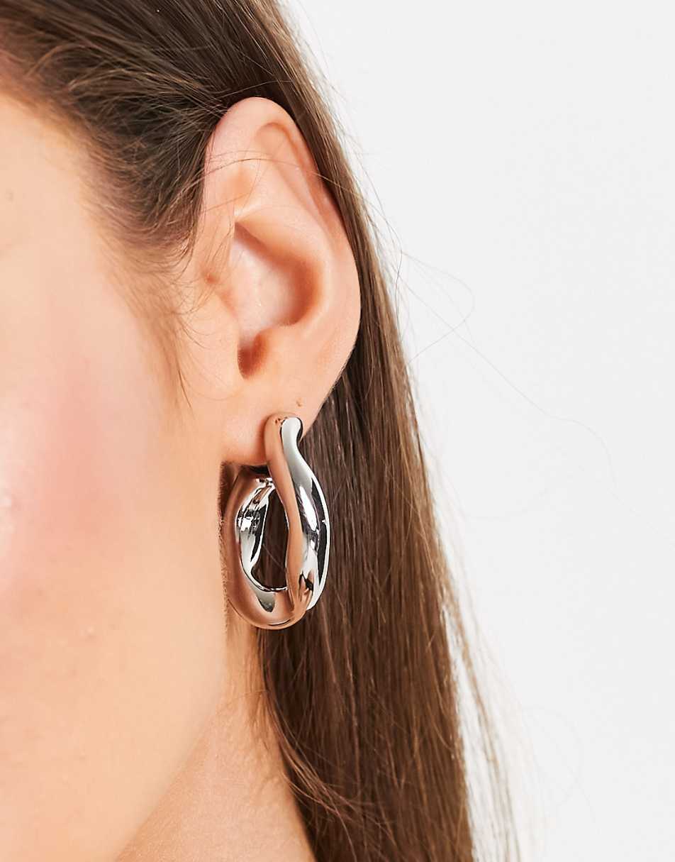 ASOS DESIGN hoop earring with twist link design in silver tone